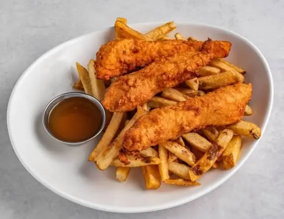 :"Golden-brown crispy chicken tenders served on a white plate with fresh parsley garnish."