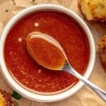 Nashville hot sauce served in a small dipping bowl