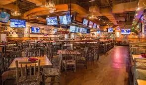 Guests enjoying a meal inside a casual dining restaurant.