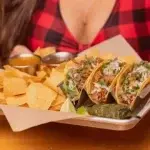 Street Tacos filled with seasoned meat, fresh vegetables, and flavorful toppings.