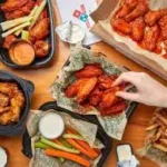Twin Peaks vs Buffalo Wild Wings showing food, wings, and sports bar experience.